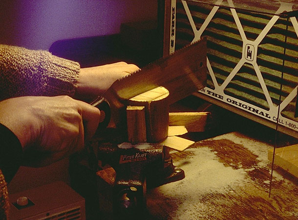 Sawing mammoth tusk, preparation for carving "Dragon Lantern"