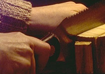 Sawing mammoth tusk,preparation for carving"Dragon Lantern"