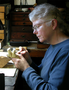 Janel at the carving bench.